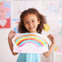 Showing off her creative work