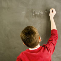 A young boy delves into theories beyond his age.
