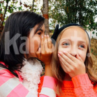 Girls. Image credit: https://pixabay.com/en/girls-whispering-best-friends-young-914823/