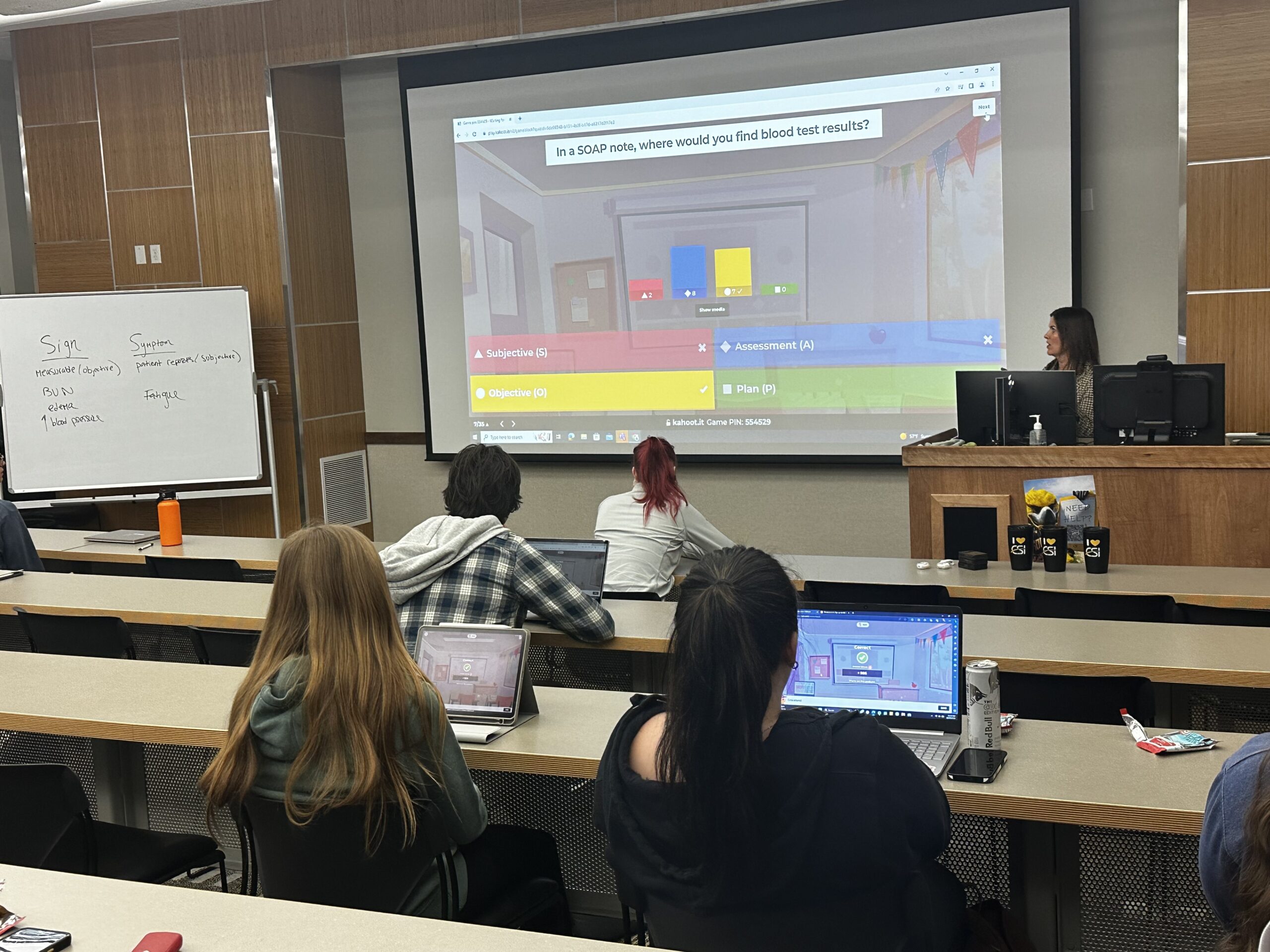 College students playing a kahoot in class.