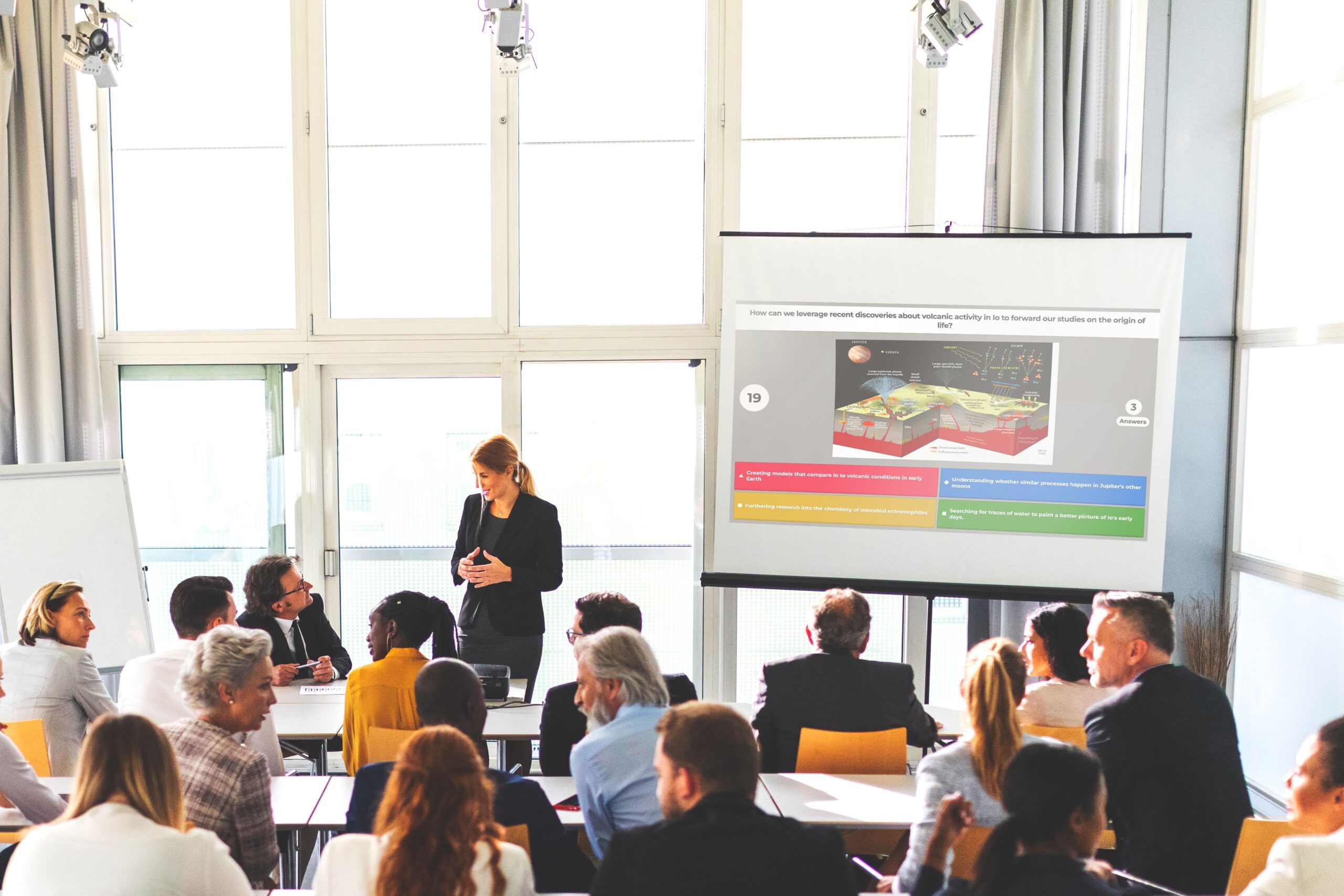 A professional delivering a presentation to an audience