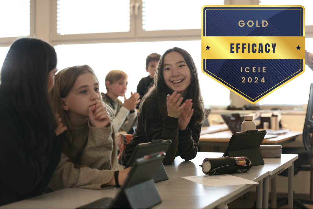 Students playing Kahoot!, with ICEIE Gold badge overlaid. 