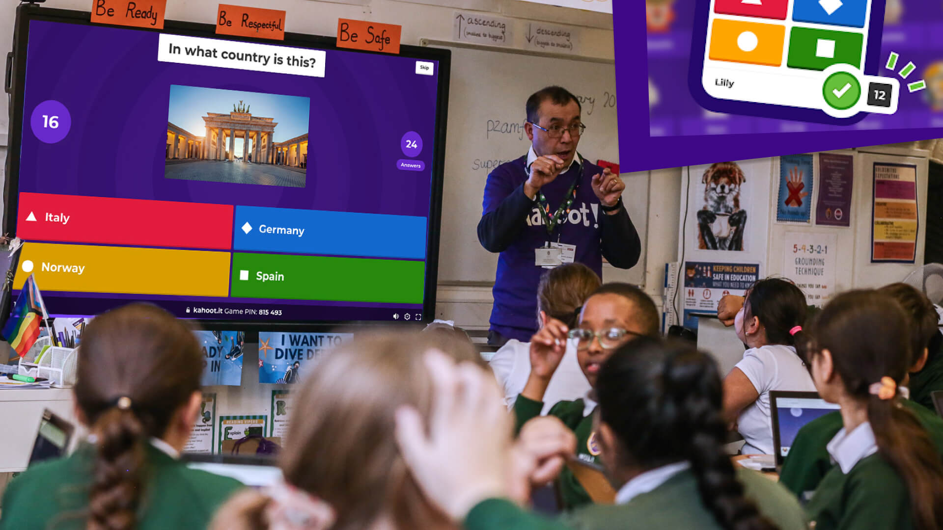 Teacher in classroom playing kahoot with primary school children