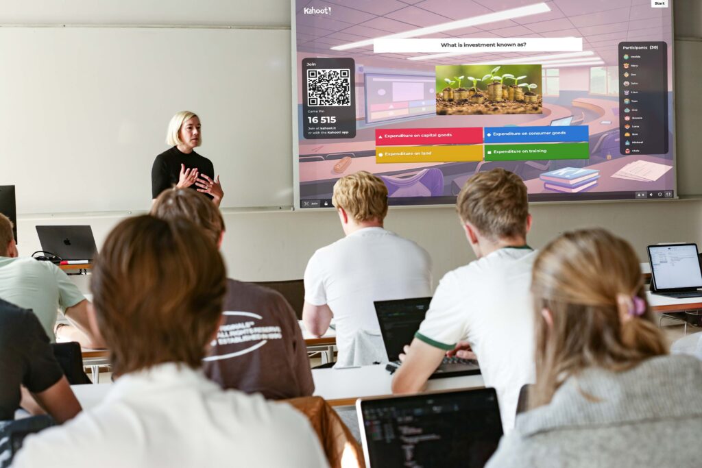 An educator standing in front of the class, using lecture mode to deliver content.