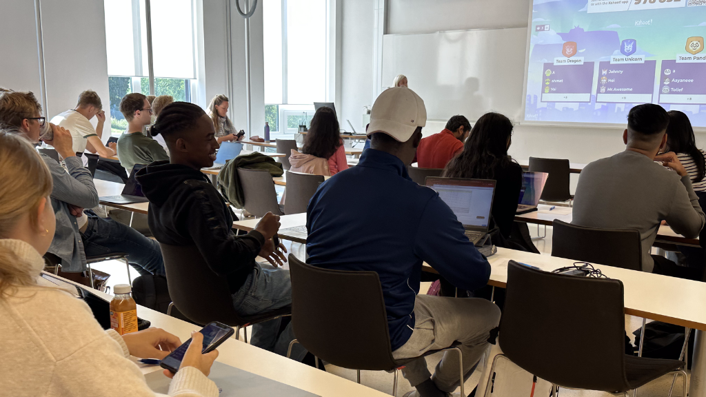 Students in higher education classroom playing Kahoot!