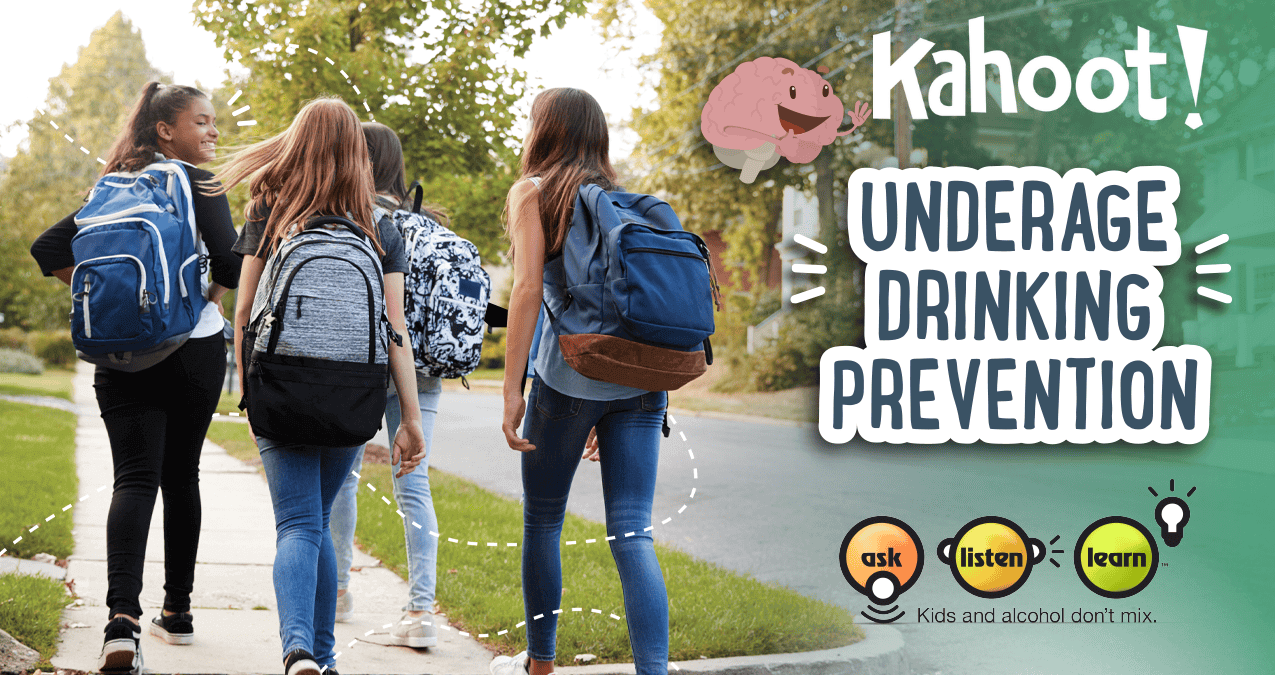 Students walking on sidewalk with backpacks