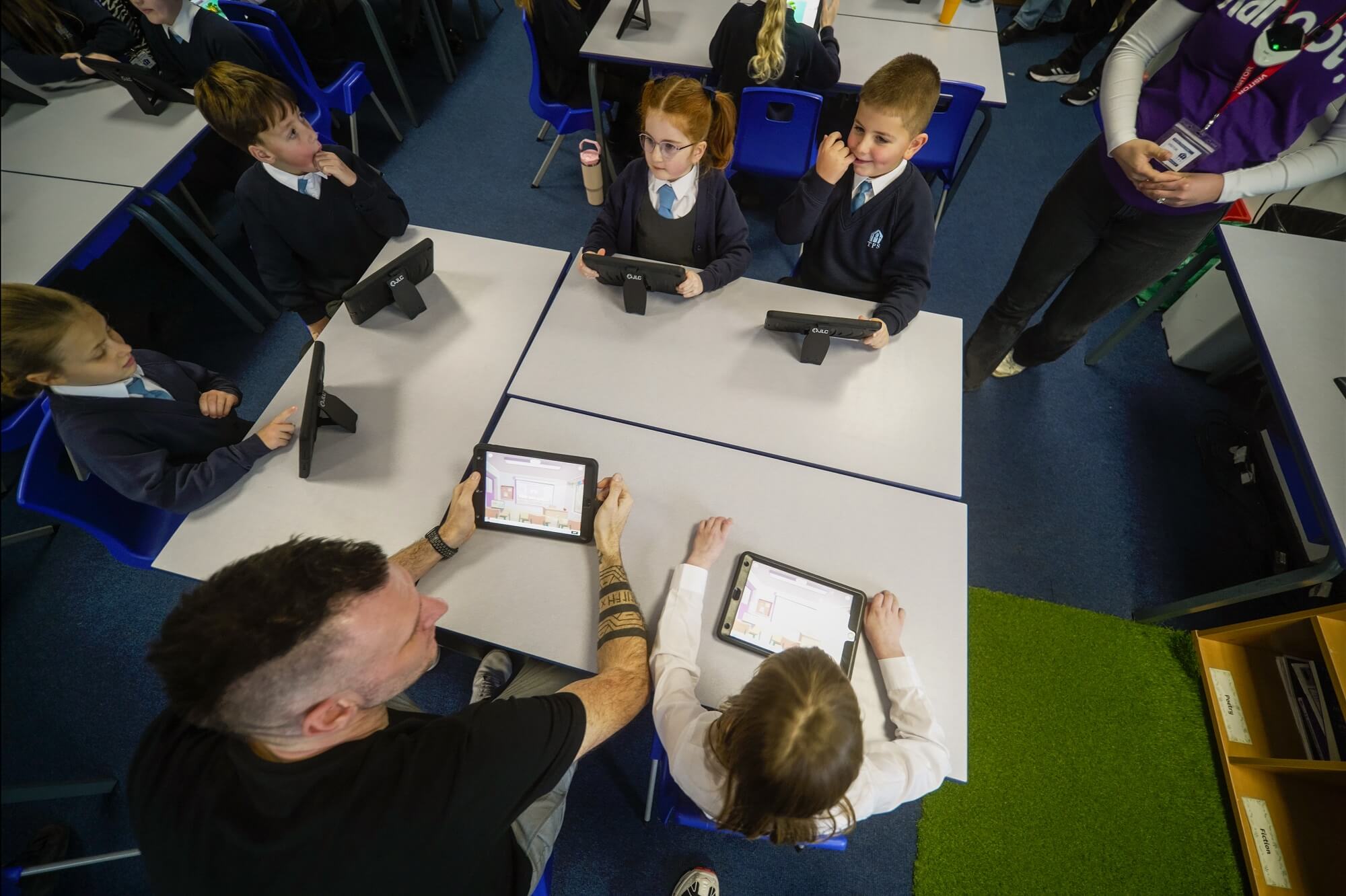 Tottington Primary School students playing Kahoot! around a classroom table