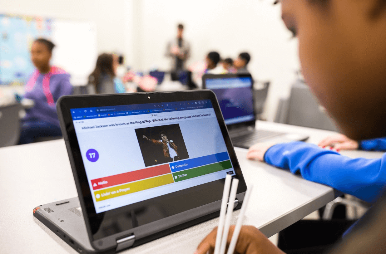 Student playing a kahoot in a classroom