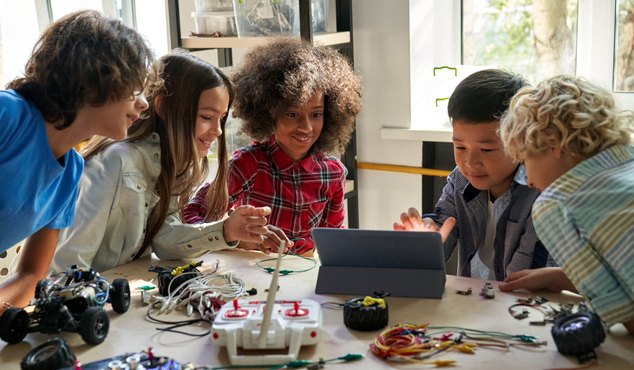 Students working on an engineering project at a table