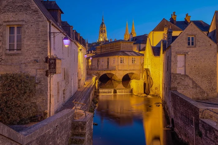 The historic centre, the Notre Dame Cathedral and the river Aure, Bayeux, Normandy, France