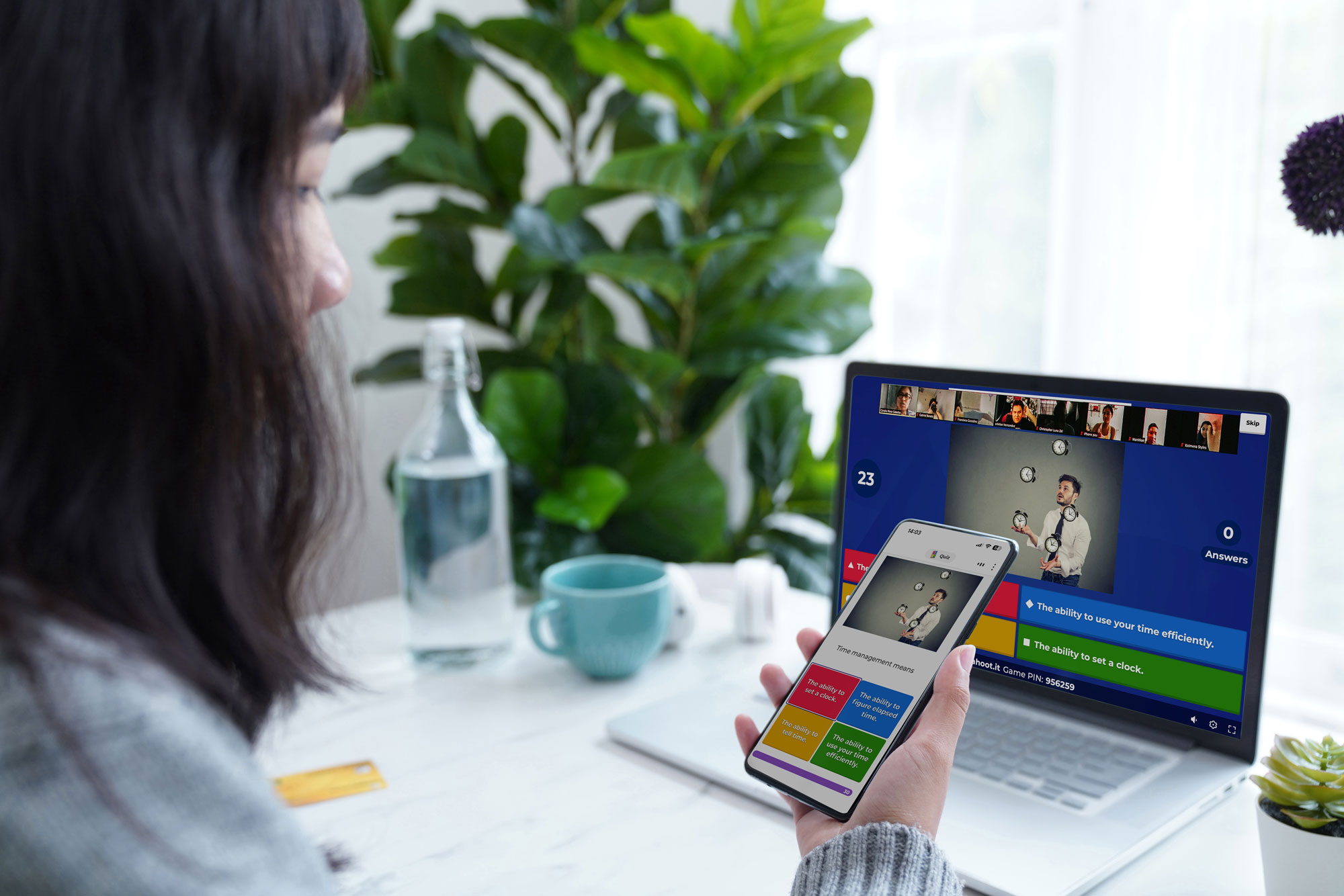 A professional playing a live virtual Kahoot! session through video conferencing.