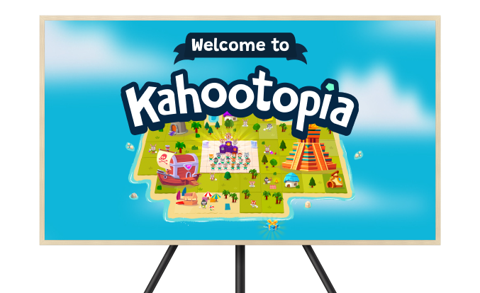 A television and a laptop screen side-by-side both display the interactive environment "Kahootopia". The TV screen shows the "Welcome to Kahootopia" landing page, which features an overhead map of a vibrant island with various themed areas, characters, and structures. The laptop screen overlays an "Achievements" window on top of the map, listing progress for subjects like Science, Mathematics, Social Studies, and Foreign Languages.
