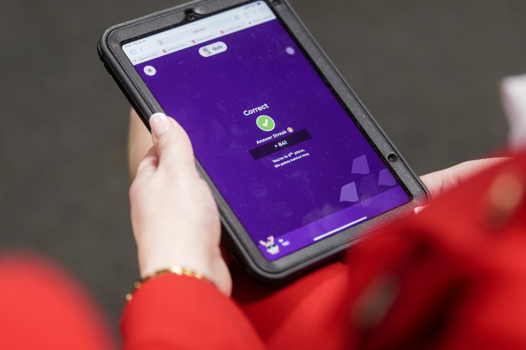 A tablet shows that a respondent answered a question correctly while playing Kahoot!