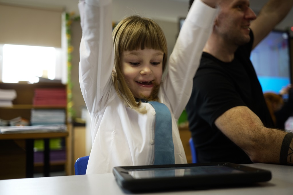 Student celebrating while playing kahoot