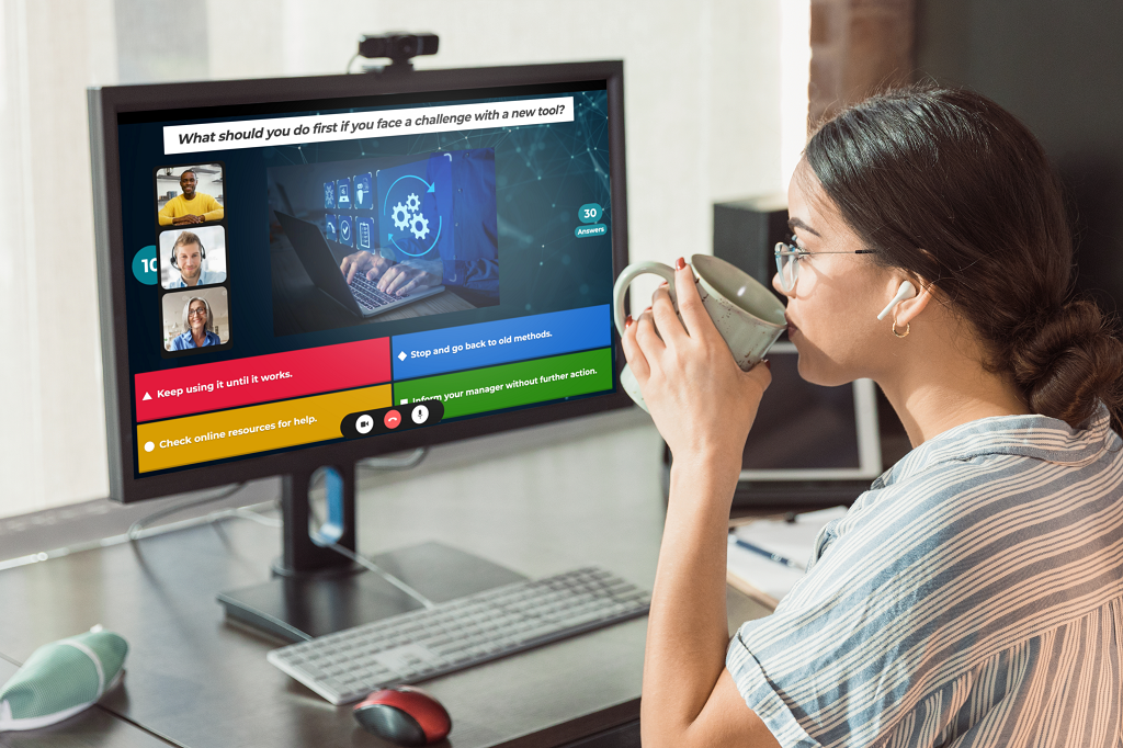 Woman employee sitting at a desk in a virtual meeting