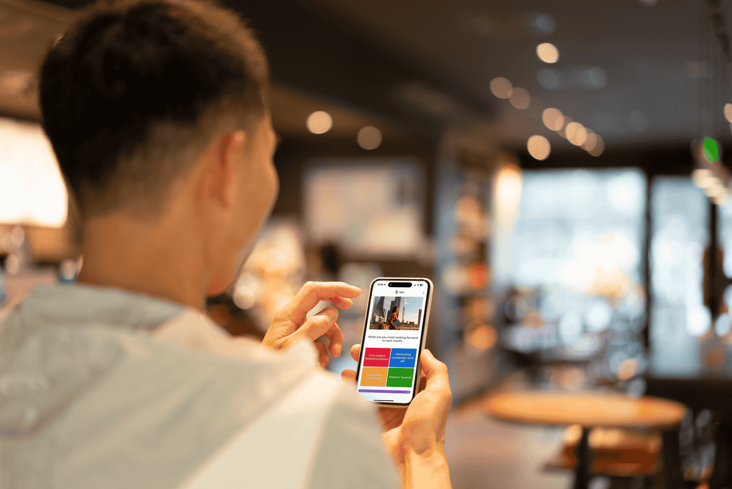 A professional playing a kahoot on a smartphone