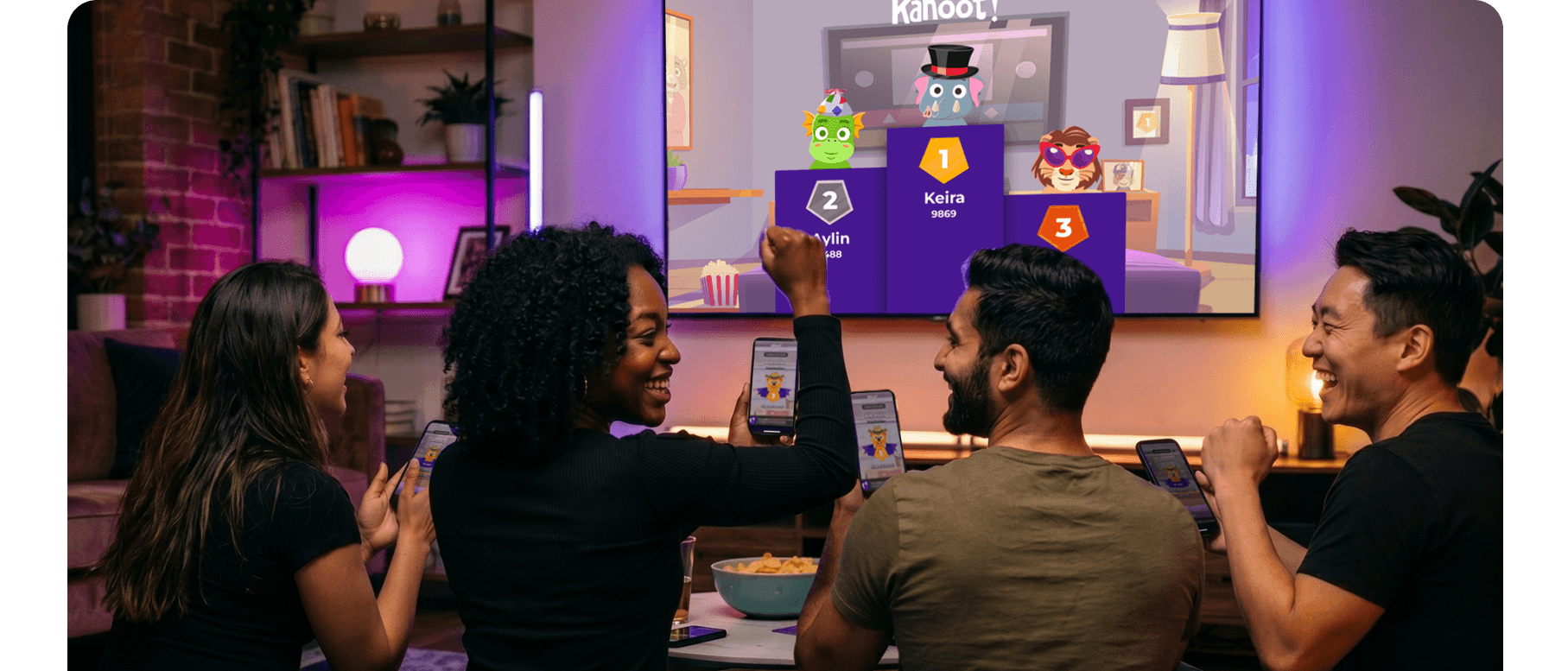 Four friends celebrating a Kahoot game leaderboard on TV, cheering with smartphones in a neon-lit living room