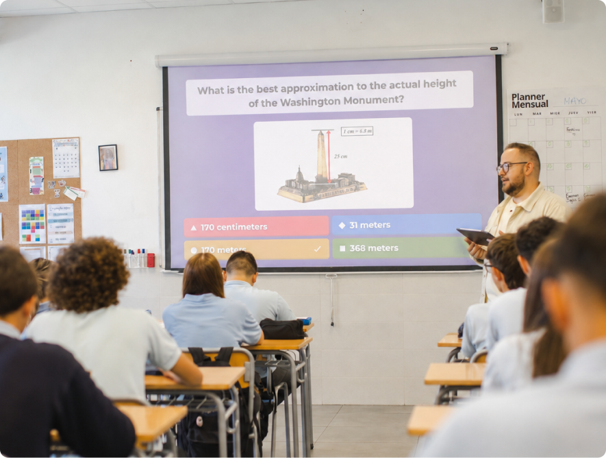 Teacher presenting a Kahoot question about the Washington Monument on a projector screen to a class