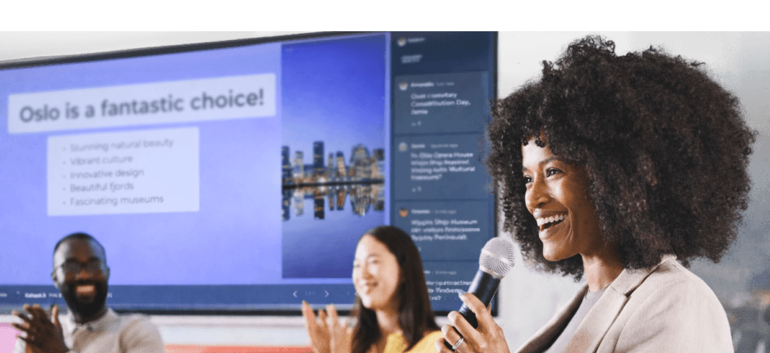A presenter speaking at a company event with a Kahoot! presentation in the background.